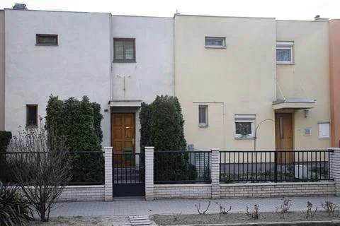 Front View of Two Pastel Colored Houses in Dunaujvaros Stock Photos