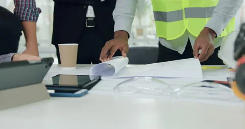 Front view of unknown skilled professional team of engineers where one of them Stock Footage 145611626