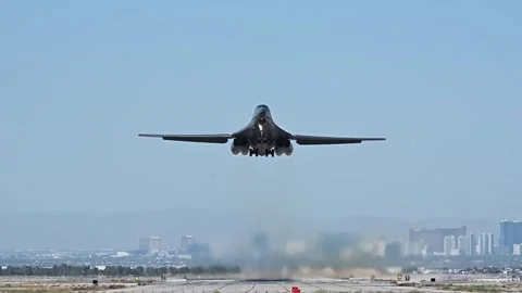 Front view of U.S. Air Force B-1B Lancer taking off from Nellis Air Force Base Stock Footage 281932040