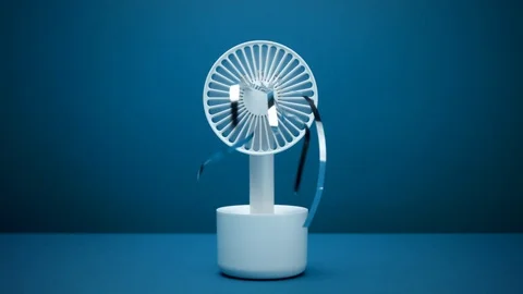 Front view ventilator blows silver strips focus zone on the end of the strips Stock Footage 116334651