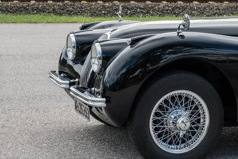 Front view from a very old black classic car on a show Stock Photos