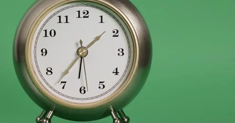 Front view, Vintage alarm clock with a short needle is walking slowly. Stock Footage 167369236