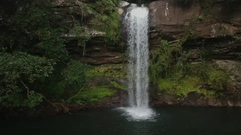 Front view of a waterfall in the forest Stock Footage 137870364