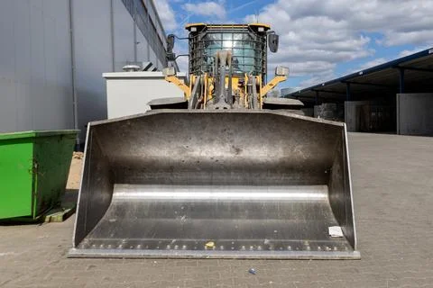 Front View of Wheel Loader Bucket at Industrial Recycling Facility Photos