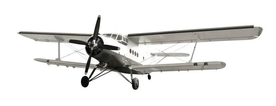 Front view of white airplane biplane with piston engine and propeller. Isolat Stock Photos