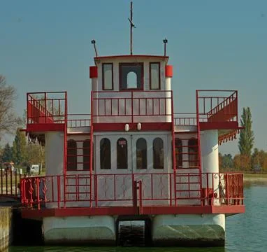 Front view on a white and red raft that look like a boat 스톡 사진