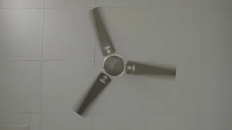 Front View of White Ceiling Fan - Shot on Sony FS7 Stock Footage 91173096