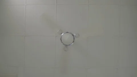 Front View of White Ceiling Fan - Shot on Sony FS7 Stock Footage 91173439