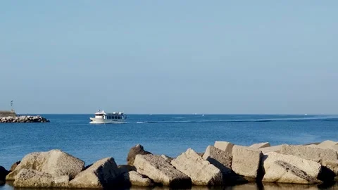 Front view of a White Pleasure Boat on a Summer Day.  Stock Footage 204064610