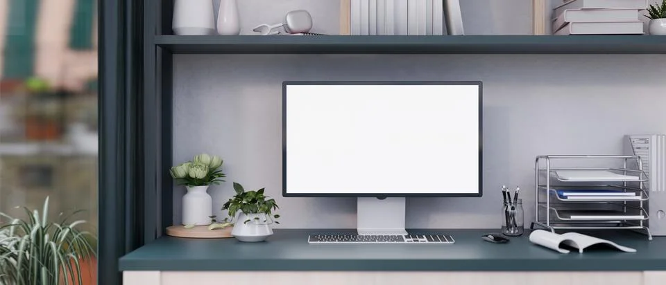 Front view of a white-screen computer mockup and office supplies on a desk .. Stock Illustration