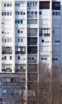 Front view of a white skyscraper and building with a lot of windows Stock Photos