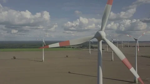 Front view on the Windmill field, Energy Production,Turbine - Aerial Stock Footage 83801043