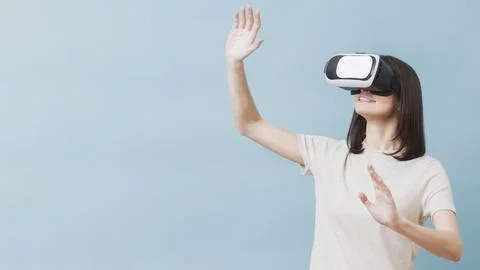 Front view woman experiencing virtual reality Stock Photos