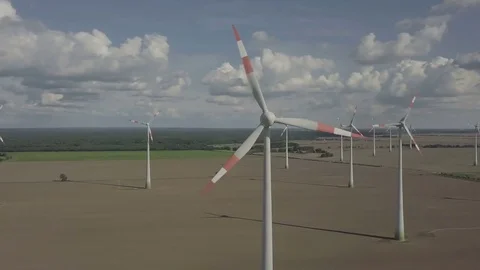 Front view on working Windmill field. Energy Production - Aerial Stock Footage 83801740