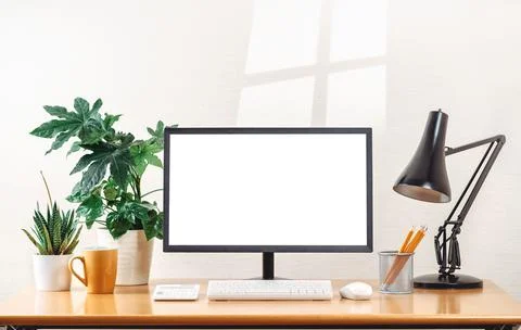 Front view of a workspace modern computer . Blank mockup screen Stock Photos