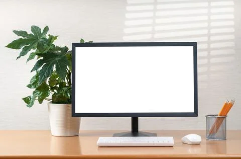 Front view of a workspace modern computer . Blank mockup screen Stock Photos