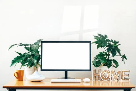 Front view of a workspace modern computer . Blank mockup screen Stock Photos