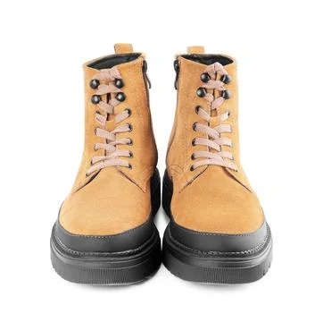 Front view of yellow suede ankle boots isolated on white background. Stylis.. Stock Photos