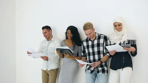 Front view of young concentrated multiracial corporate coworkers which standing Stock Footage 121842250