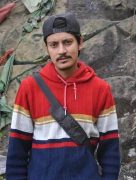 Front view of a young guy with wearing cap backwards, looking at camera Foto stock