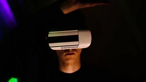 Front view of young guy which moving his hands in the air as on virtual screen Stock Footage 130176246