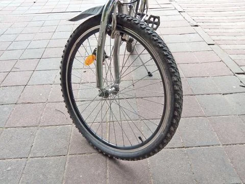 The front wheel of a bicycle Фото