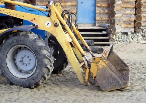 Front wheel loader for construction and repair work Stock Photos