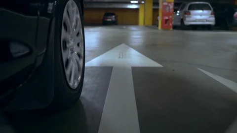 The front wheel of a moving car. The camera is mounted near the wheel. Stock Footage 120359274