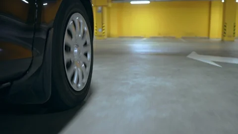 The front wheel of a moving car. The camera is mounted near the wheel. Stock Footage 120359353