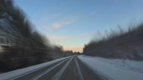 Front window point of view driving on snow covered winter road in Lapland w.. 스톡 동영상 328409591