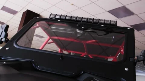 Front window UTV buggy with headlights Stock Footage 173113260