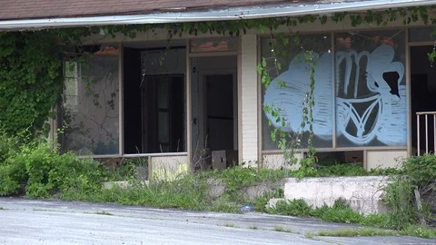 Front Windows of Abandoned Building Stock Footage 89559634