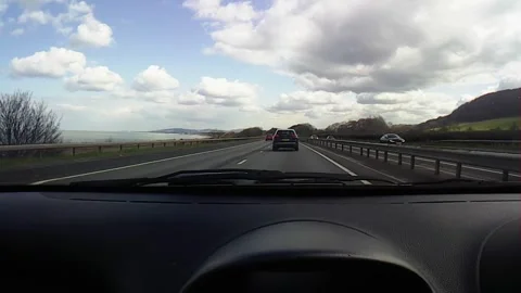 Front windscreen driving on duel carriageway Stock Footage 247561328