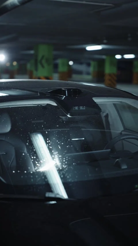 Front windshield of modern electric car in parking garage Video stock 318418069