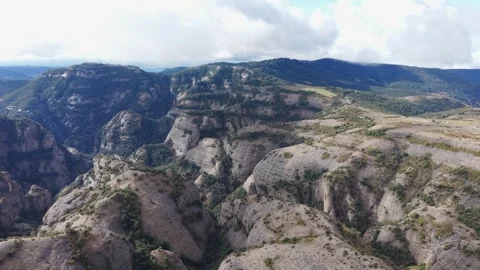 Frontal drone flight over rocky cliffs in the Pre-Pyrenees of Catalonia, Spain Stock-Footage 305686173