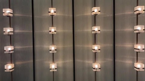 Frontal Shot of Modern Wall with Grid of Warm Light Cubes Stock Footage 333130804