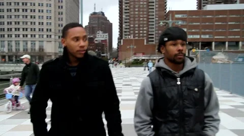 Frontal view black men walking Stock Footage 54470023