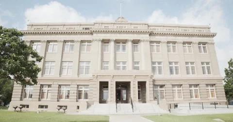Frontal view of the Cameron County courthouse building in Brownsville, Stock Footage 202449852