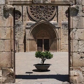 Frontal view of the complex of the Monastery of Sant Cugat in Spain. Stock Photos