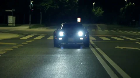 Frontal view shot of blue Corvette heading towards the camera Stock Footage 33003633