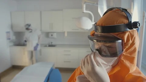 Frontline Coronavirus Doctor Getting Ready for Her Shift in the Hospital Stock Footage 129200224