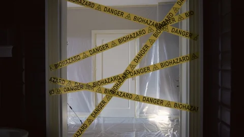 Frontline Worker in Full Hazmat Suit Enters Coronavirus Contaminated Room Stock Footage 129190883