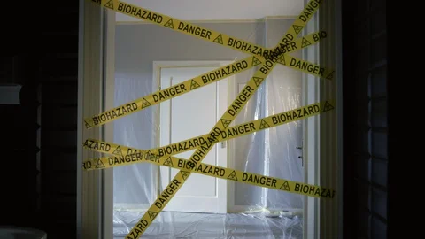 Frontline Worker in Full Hazmat Suit Leaves Coronavirus Contaminated Room Stock Footage 129193467
