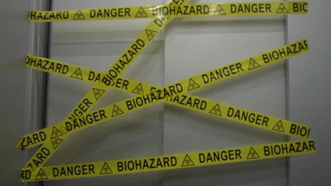 Frontline Worker in Full Hazmat Suit Standing in Coronavirus Contaminated Stock Footage 129197690