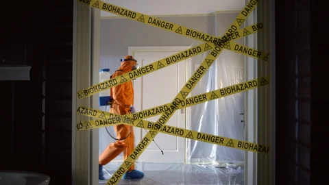Frontline Worker in Full Hazmat Suit Enters Coronavirus Contaminated Room Stock Footage 129199466