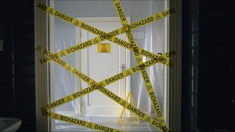 Frontline Worker Rips Biohazard Barricade Tape and Enters Coronavirus Stock Footage 129189096