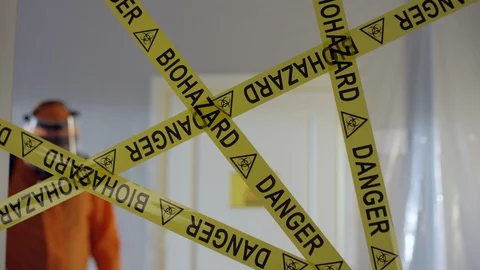 Frontline Worker Rips Biohazard Barricade Tape and Enters Coronavirus Stock-Footage 129200315