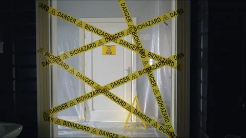 Frontline Worker Rips Biohazard Barricade Tape and Enters Coronavirus Stock Footage 129201908