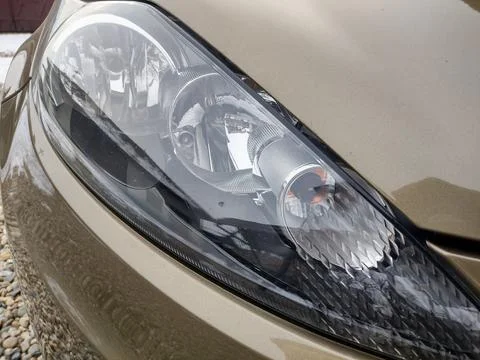 The fronts lights of a car Photos