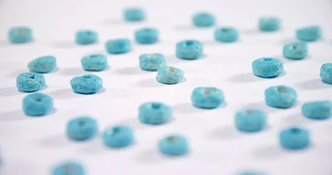 Froot loops arranged on white background 4k Stock Footage 88905701